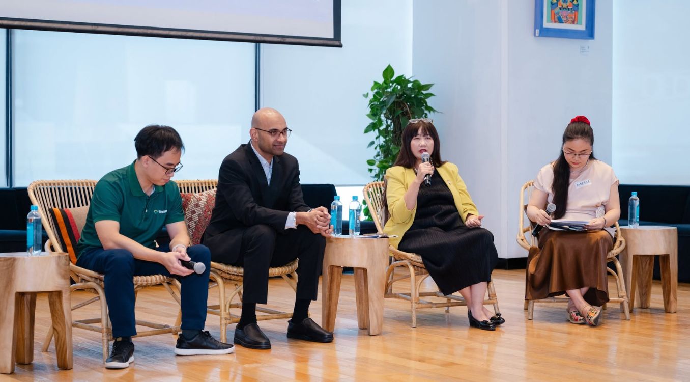 Panel discussion at SMU Executive Dialogue 2026 with speakers from SMU, FPT Software and Finan
